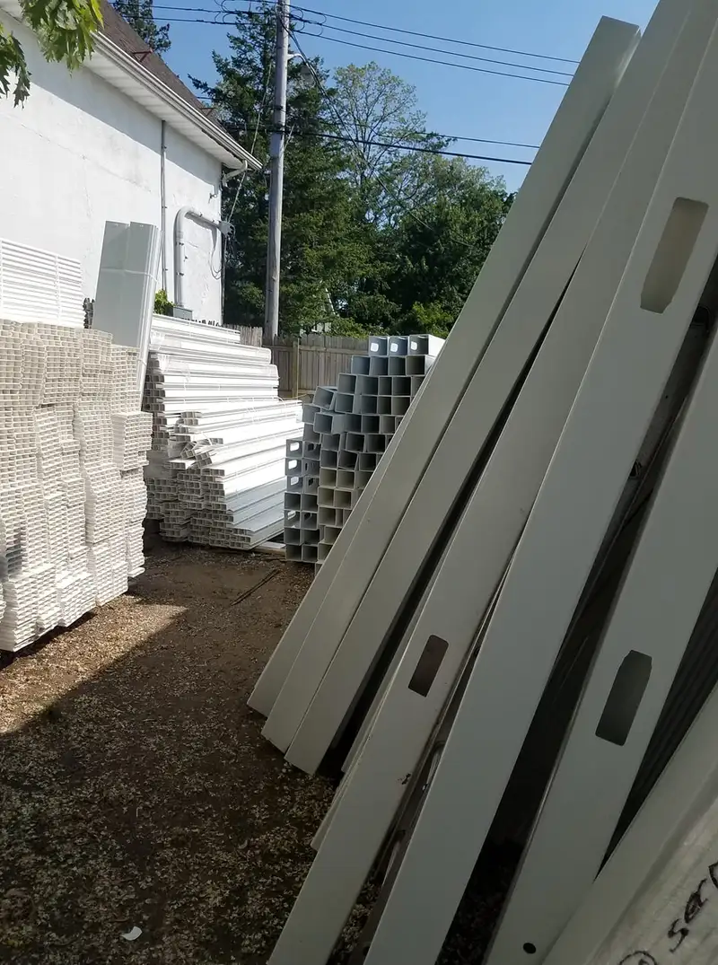 White vinyl fence with decorative top trim by Fencing By Excellence near Holmdel, Monmouth County NJ