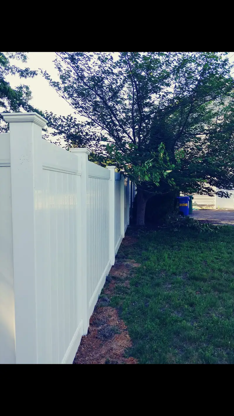Wood privacy fence in suburban backyard by Fencing By Excellence near Howell, Monmouth County NJ