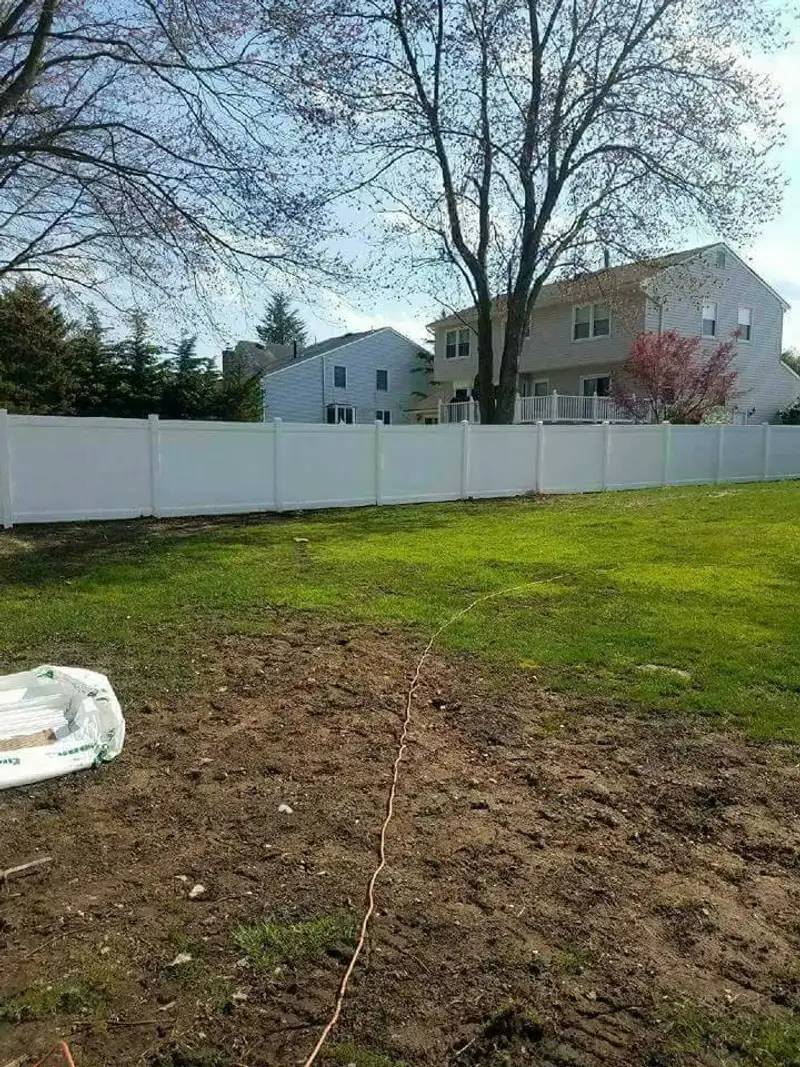 Vinyl privacy fence residential installation by Fencing By Excellence near Atlantic Highlands, Monmouth County NJ