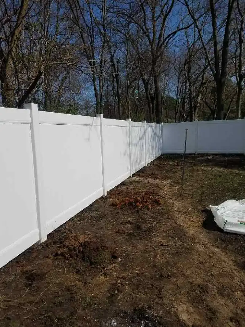White vinyl gate installation completed by Fencing By Excellence near Howell, Monmouth County NJ