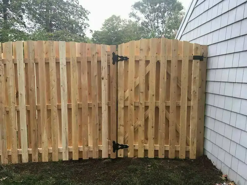 Wood gate installation with black hardware by Fencing By Excellence near Atlantic Highlands, Monmouth County NJ