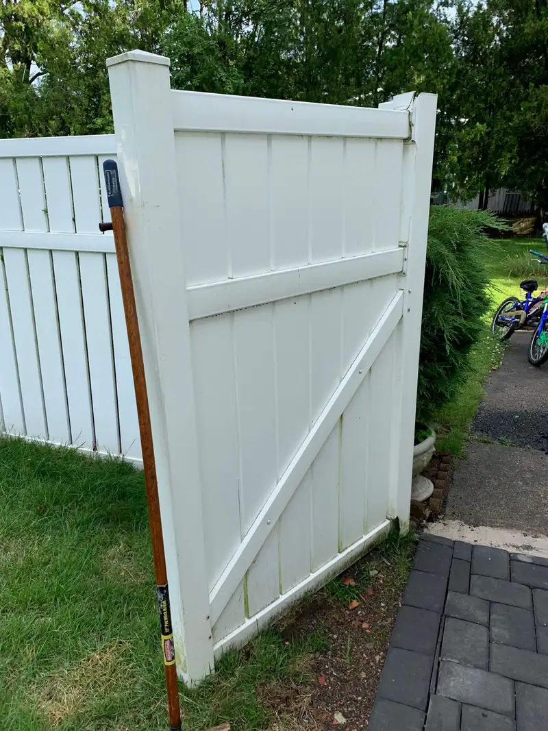 White vinyl horizontal board gate detail by Fencing By Excellence near Atlantic Highlands, Monmouth County NJ